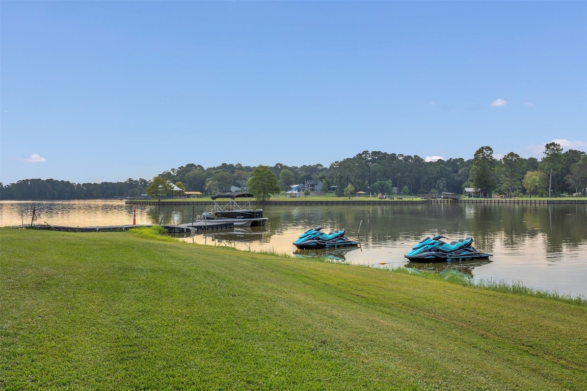 42 Trail Lake Trinity, TX 75862 - Photo 50 of 50 a view of a lake with houses in the back