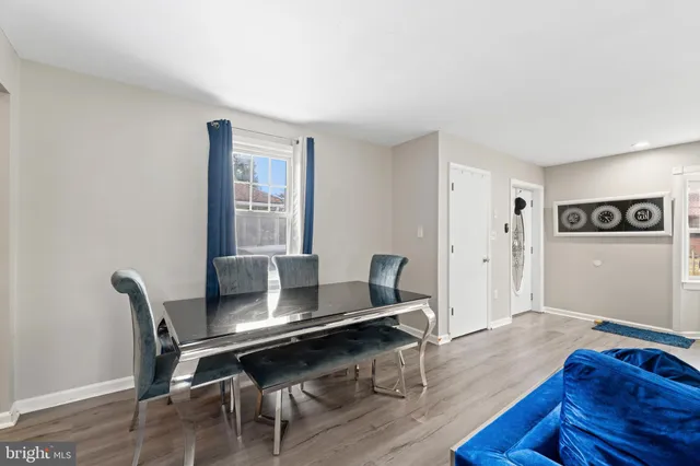 a workspace with furniture and wooden floor