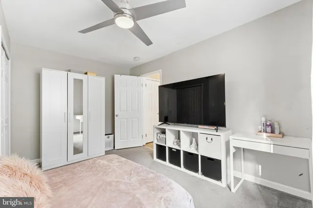 a view of a livingroom with furniture and chandelier