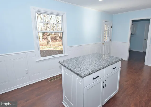 a view of a room with rack on the wall