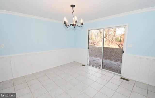a view of an entryway with furniture and window