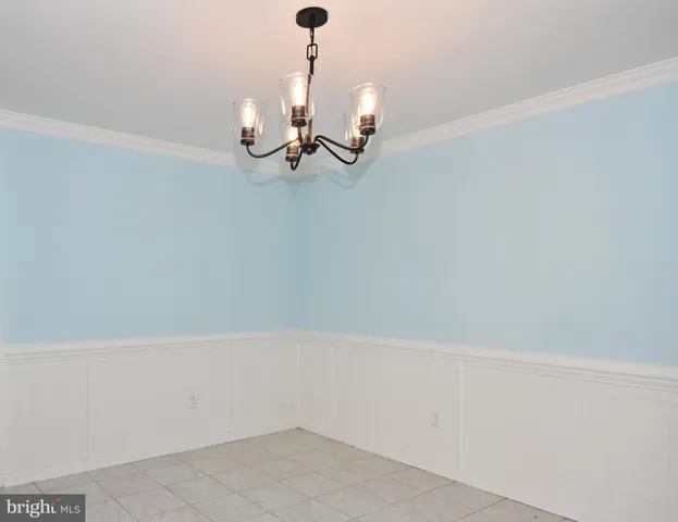 a bathroom with a sink a mirror and vanity