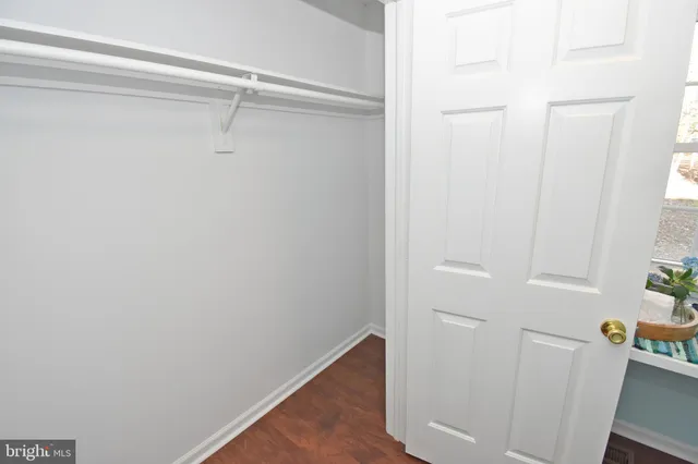 a view of a room with a fan