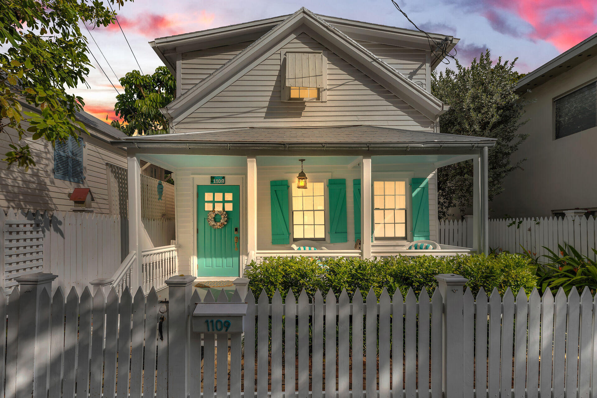 a front view of a house with a porch