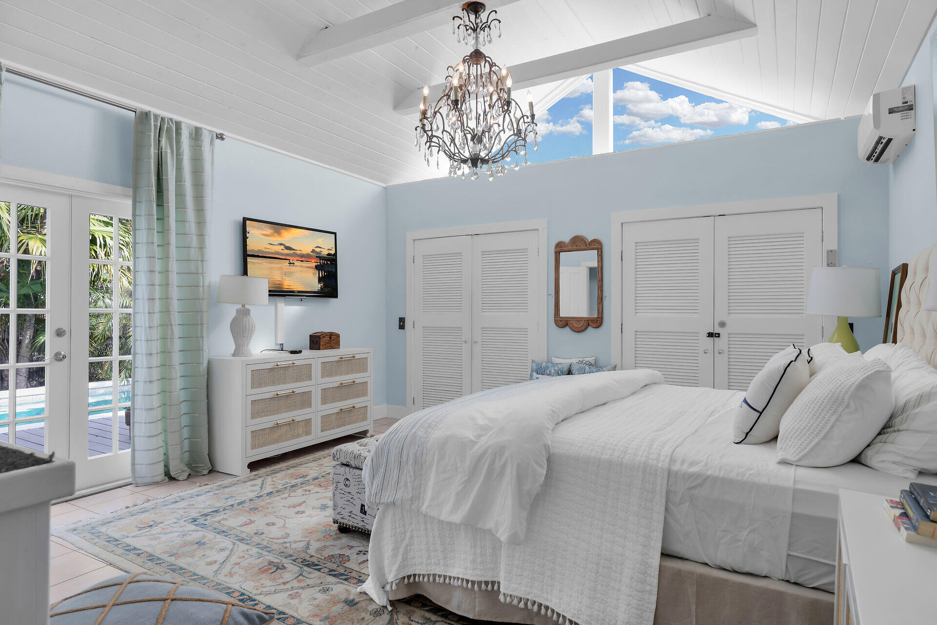 1109 Stump Lane Key West, FL 33040 - Photo 18 of 46 a bedroom with a bed and a flat screen tv