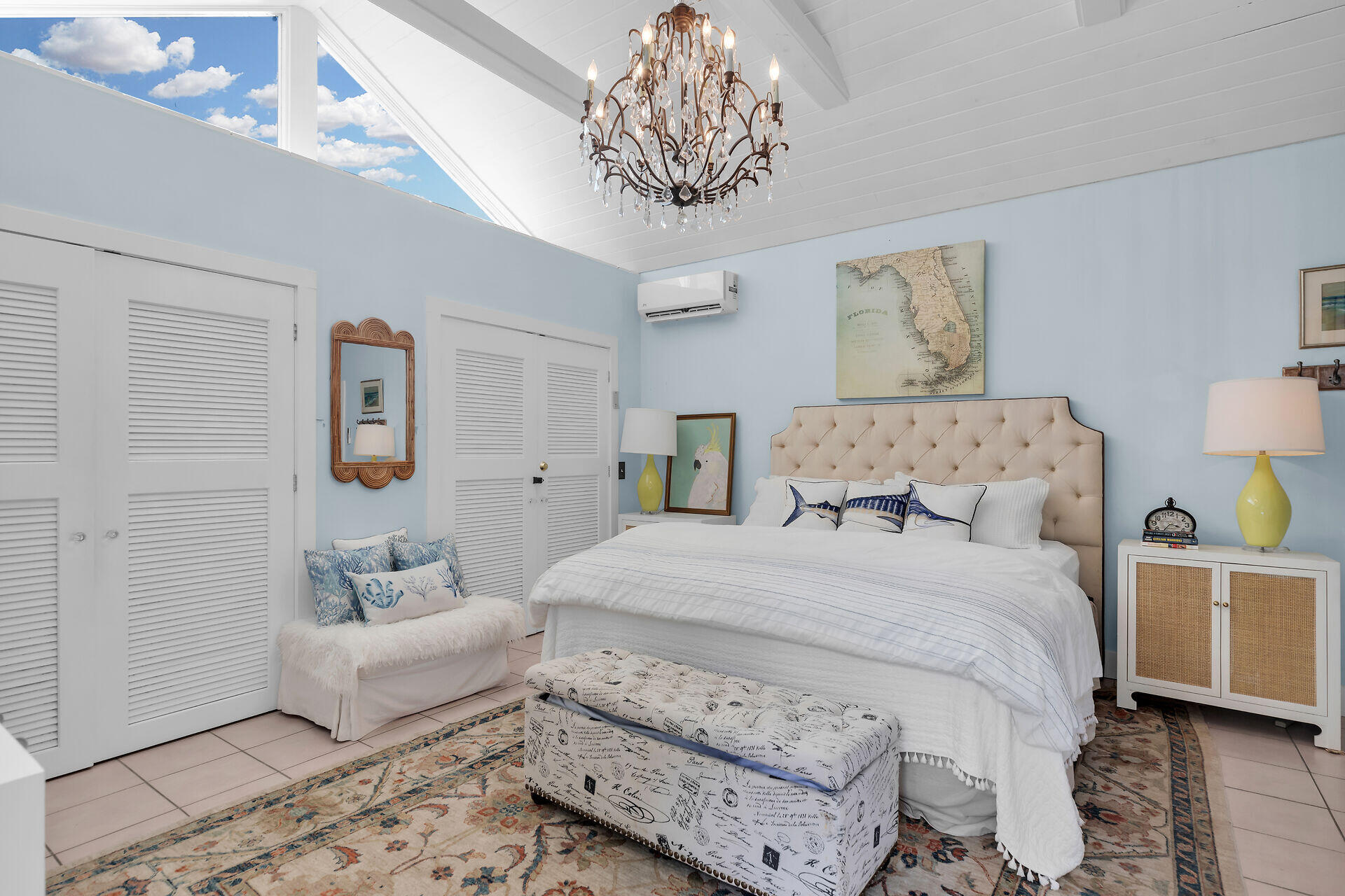 1109 Stump Lane Key West, FL 33040 - Photo 19 of 46 a bedroom with a bed and a chandelier