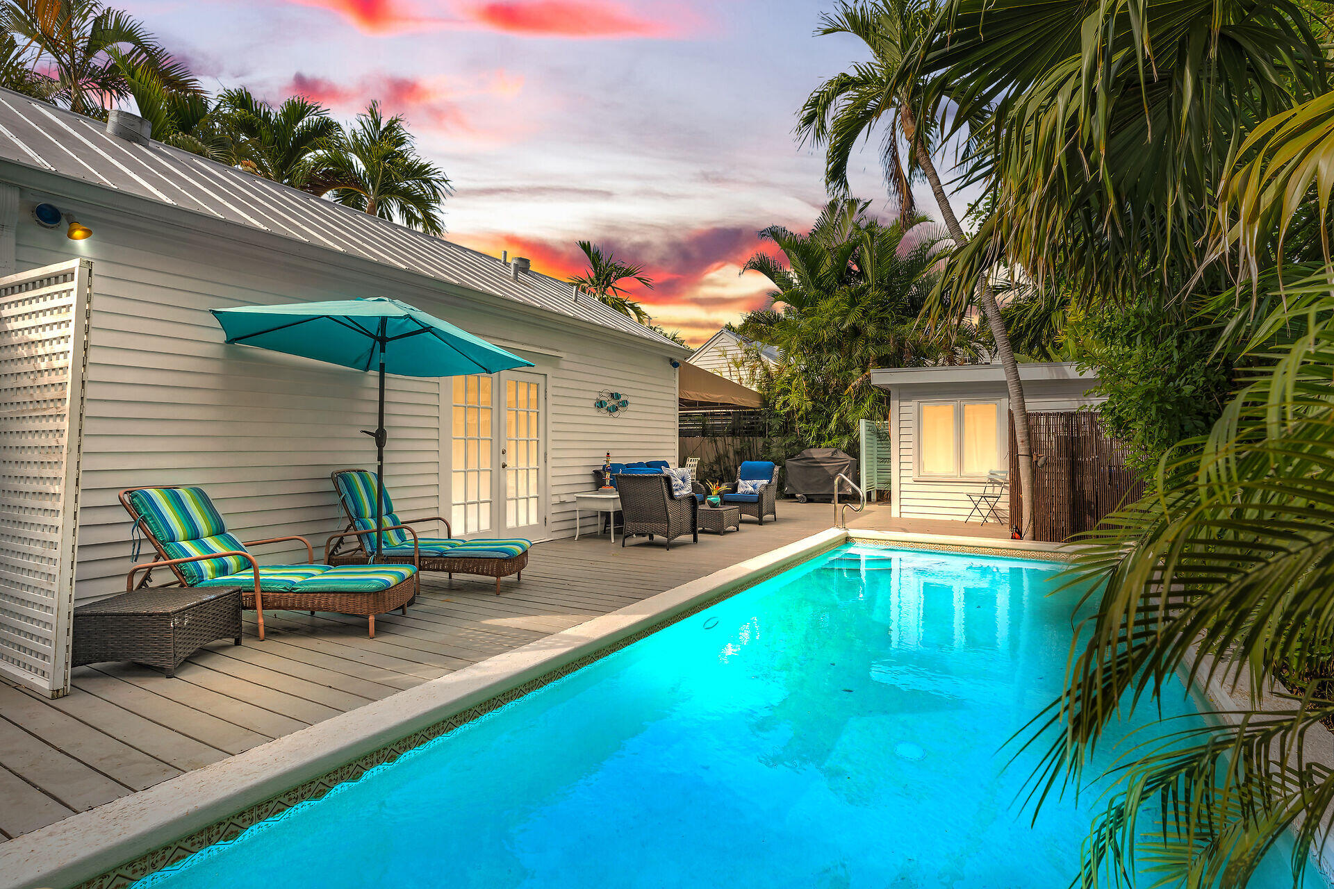 1109 Stump Lane Key West, FL 33040 - Photo 2 of 46 a view of a house with swimming pool and sitting area