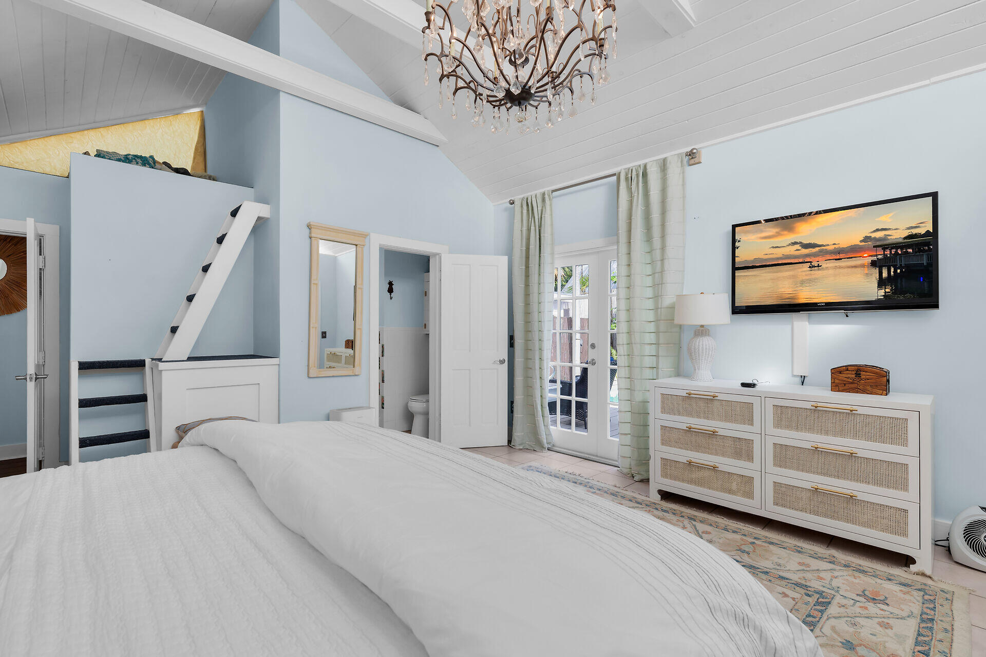 1109 Stump Lane Key West, FL 33040 - Photo 21 of 46 a bedroom with furniture and a flat screen tv