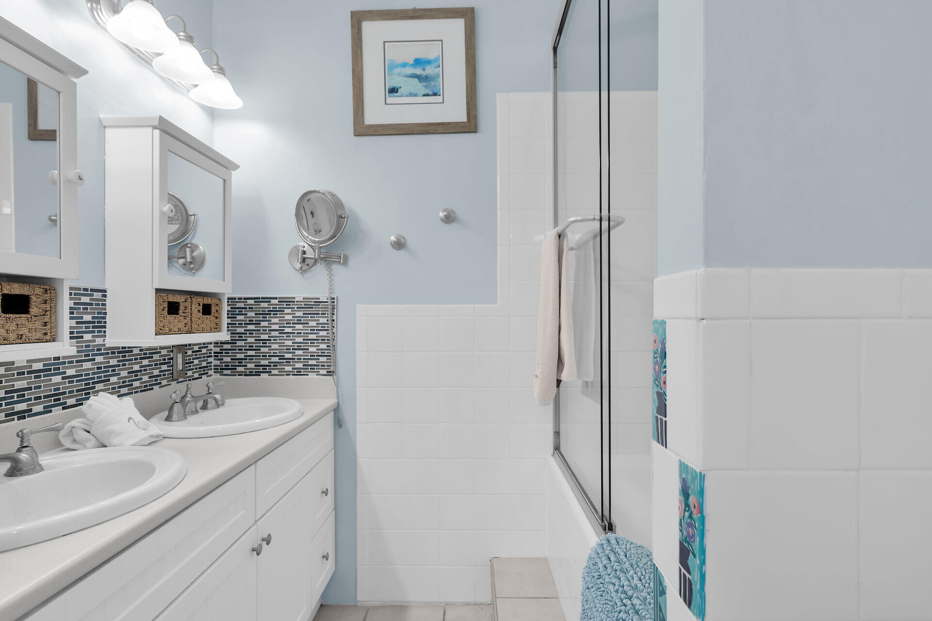 1109 Stump Lane Key West, FL 33040 - Photo 23 of 46 a bathroom with a sink a mirror and shower