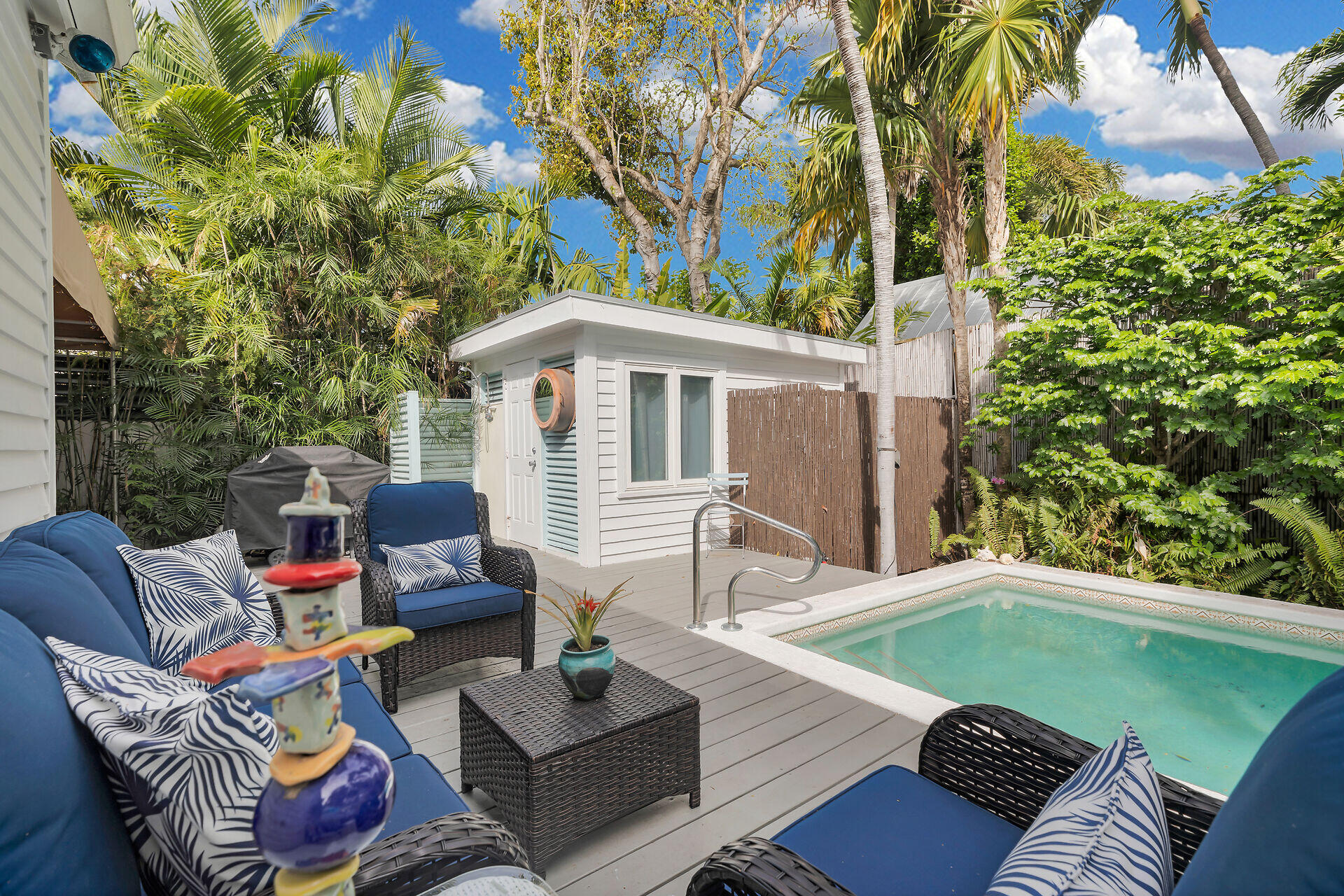 1109 Stump Lane Key West, FL 33040 - Photo 29 of 46 a backyard of a house with seating space