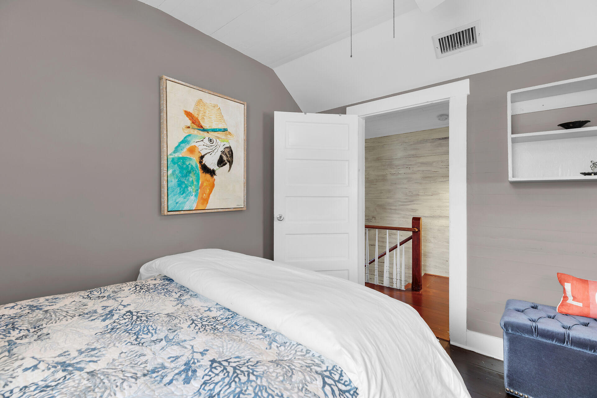 1109 Stump Lane Key West, FL 33040 - Photo 42 of 46 a bedroom with a bed and painting on the wall