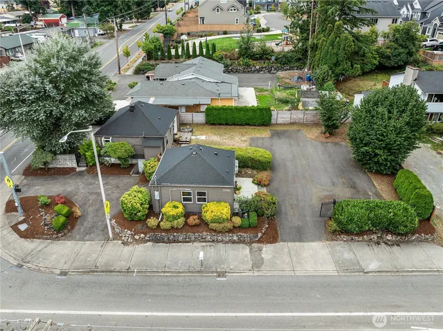 an aerial view of a house with a garden and plants