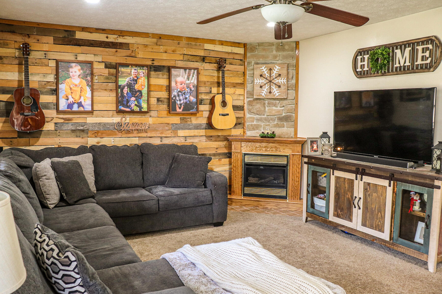 1008 Dusty Rock Road Northwest Riner, VA 24149 - Photo 11 of 28 a living room with furniture and a flat screen tv