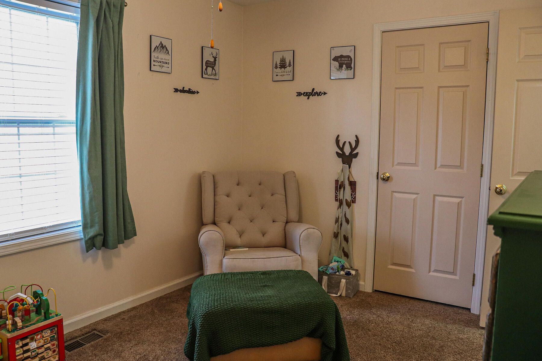 1008 Dusty Rock Road Northwest Riner, VA 24149 - Photo 13 of 28 a living room with furniture and a window