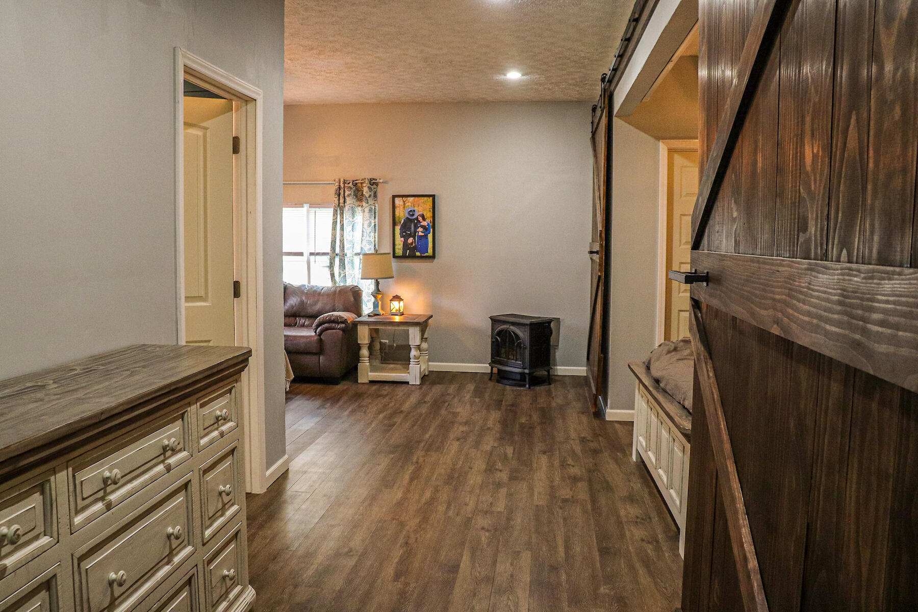 1008 Dusty Rock Road Northwest Riner, VA 24149 - Photo 16 of 28 a living room with furniture and a fireplace