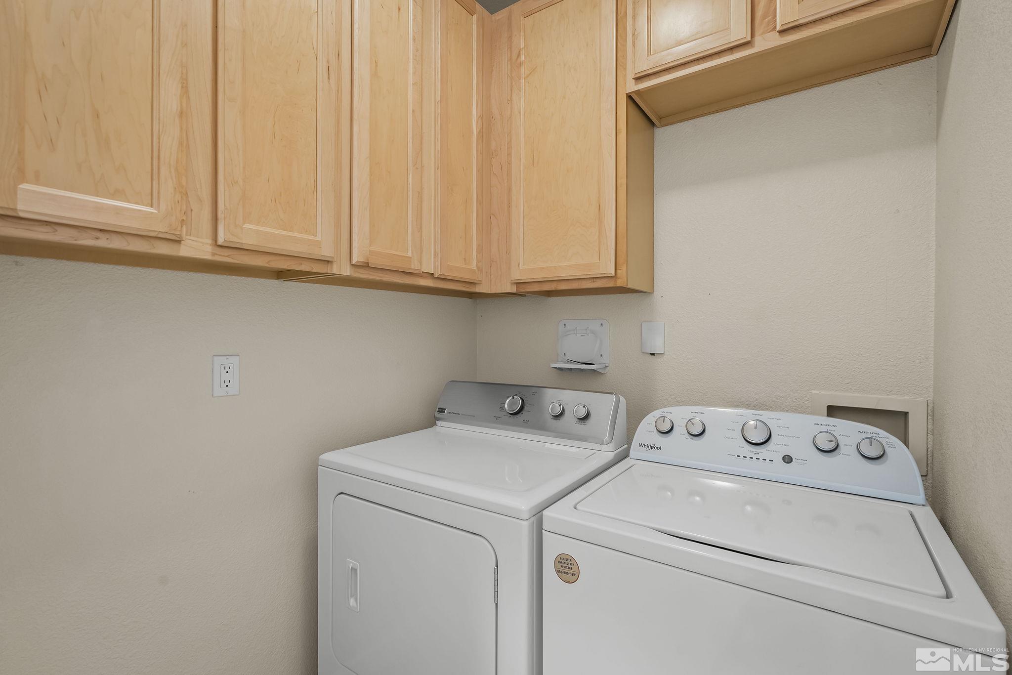 2150 Soldier Pass Court Reno, NV 89523 - Photo 28 of 38 a utility room with dryer and washer