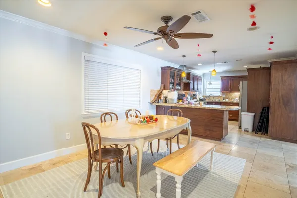 a view of a dining room with furniture