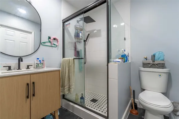 a view of entrance gate with wooden fence