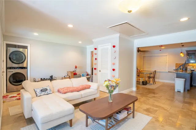 a living room with furniture and a table