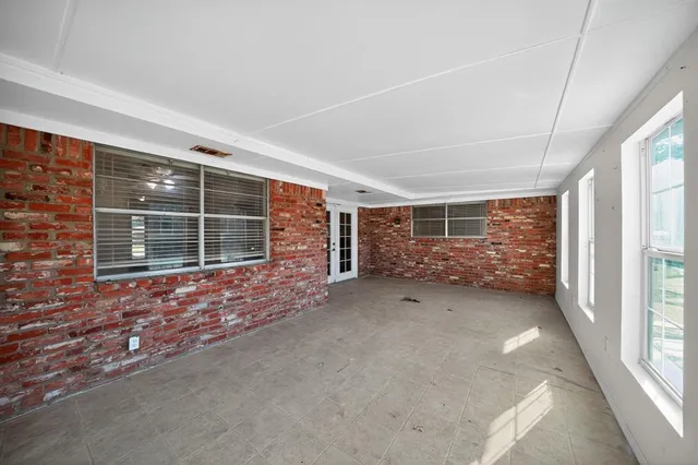 a view of a house with a large window