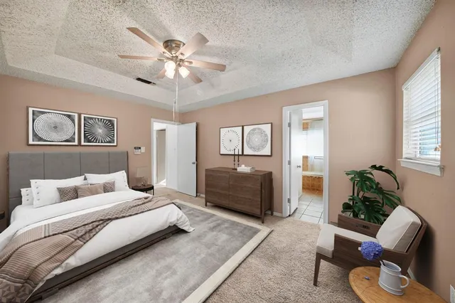 a bedroom with a bed and furniture