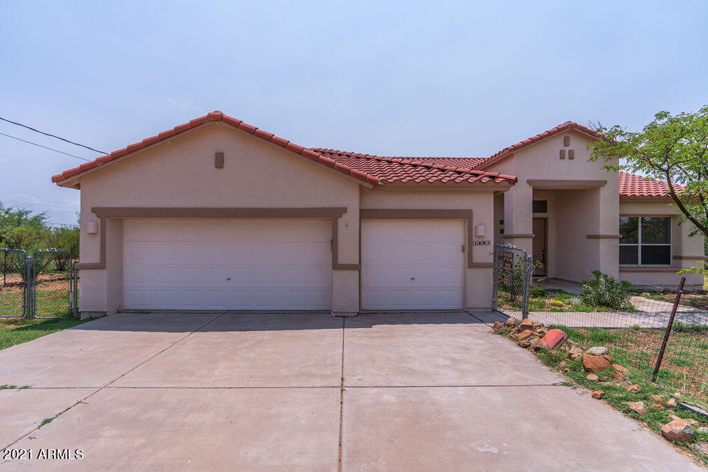 1603 Huron Court Rio Rico, AZ 85648 - Photo 2 of 45 Front of home