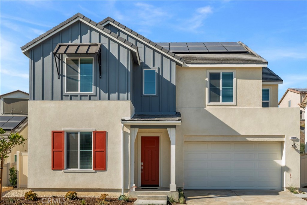 18121 Outlook Way Saugus, CA 91350 - Photo 1 of 59 a view of a house with a garage and balcony