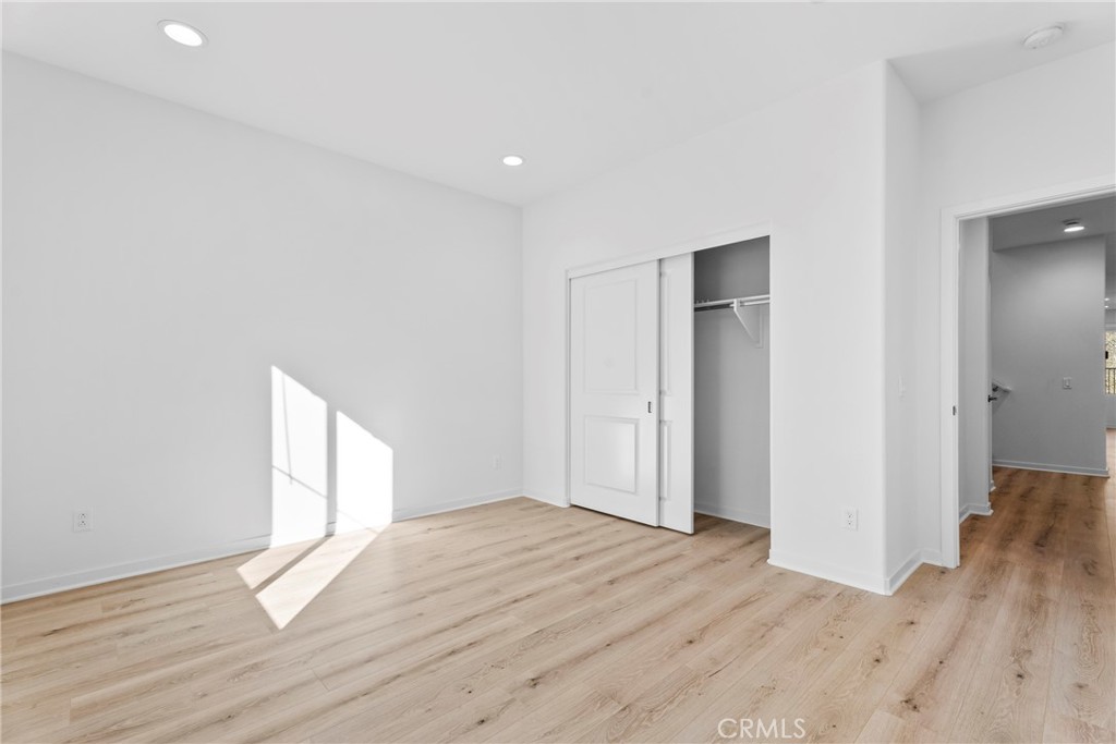 18121 Outlook Way Saugus, CA 91350 - Photo 16 of 59 a view of empty room with wooden floor