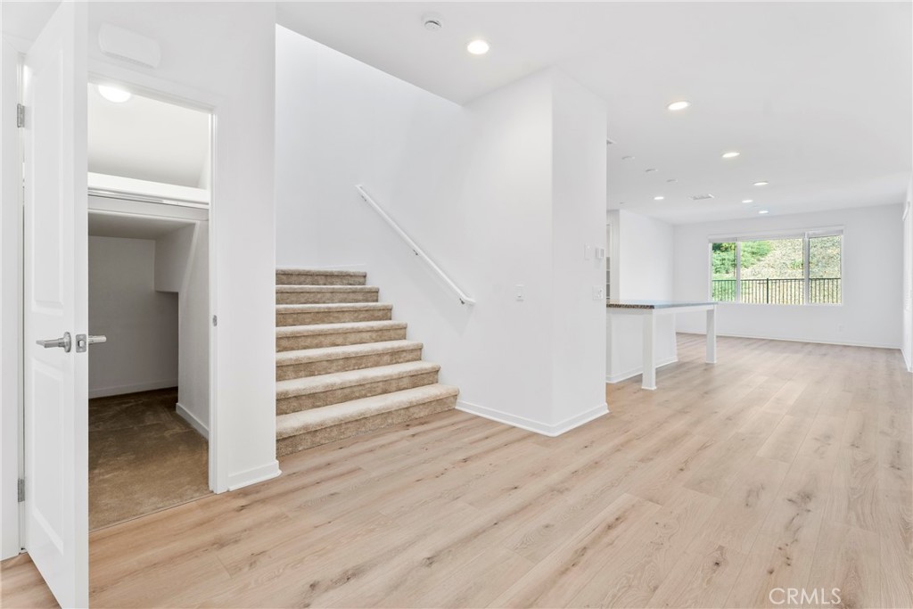 18121 Outlook Way Saugus, CA 91350 - Photo 18 of 59 wooden floor in an empty room with a window