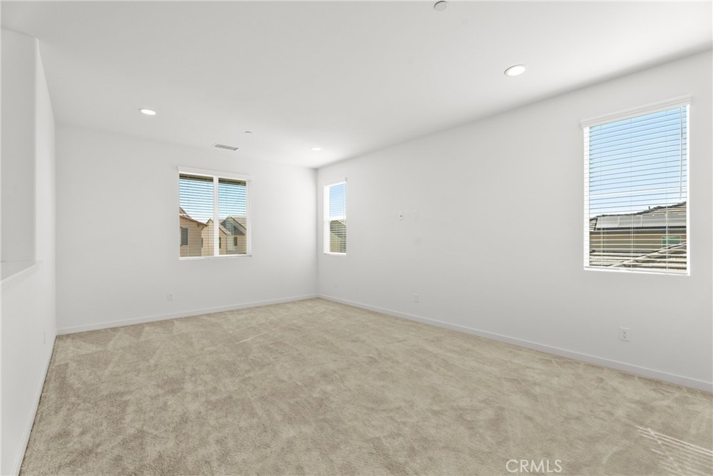 18121 Outlook Way Saugus, CA 91350 - Photo 21 of 59 an empty room with windows