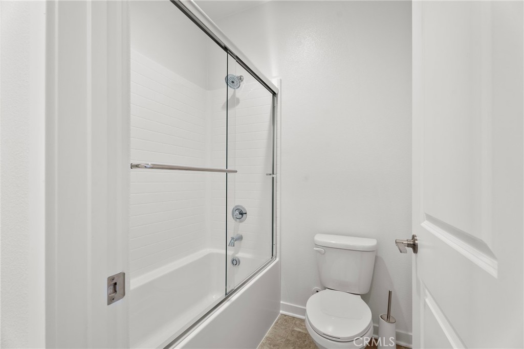 18121 Outlook Way Saugus, CA 91350 - Photo 24 of 59 a white toilet sitting next to a bath tub