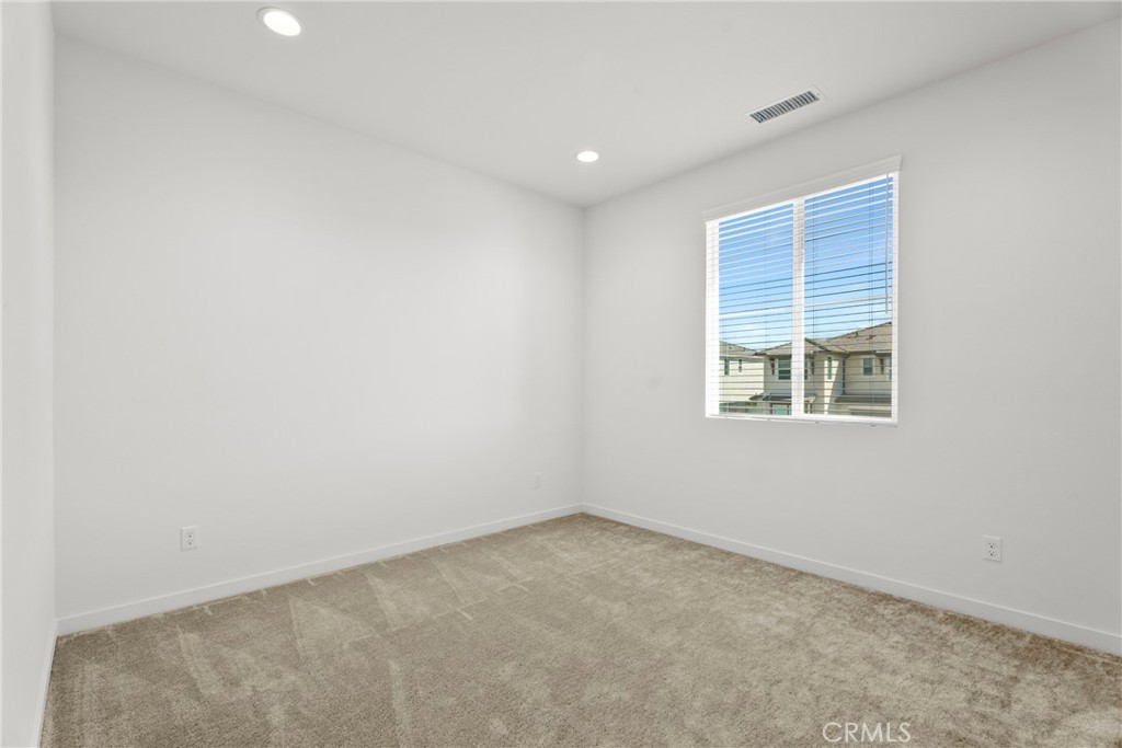 18121 Outlook Way Saugus, CA 91350 - Photo 25 of 59 an empty room with a window