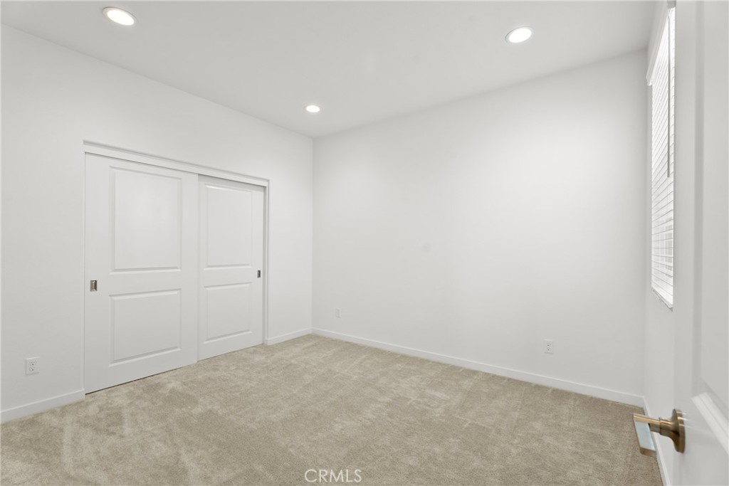 18121 Outlook Way Saugus, CA 91350 - Photo 27 of 59 an empty room with closet area