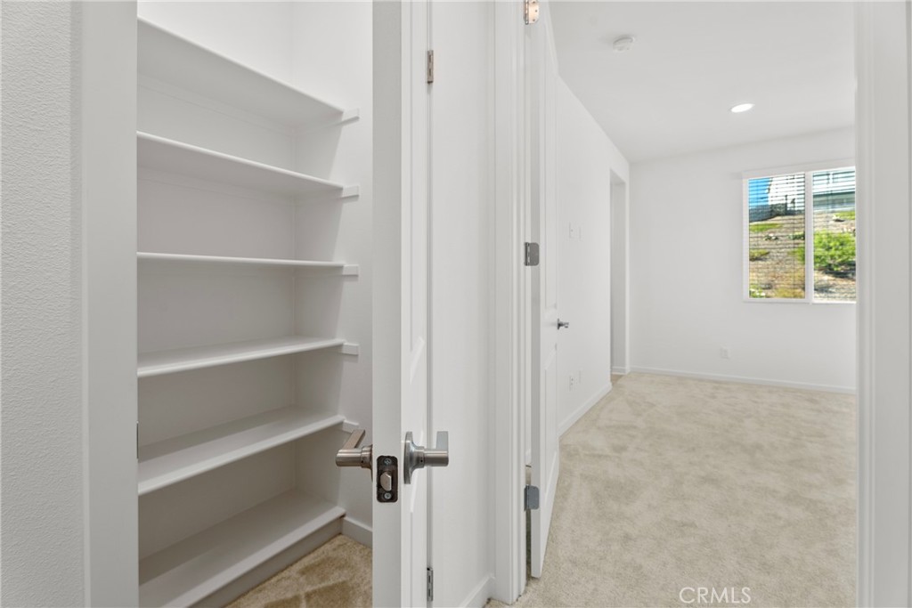 18121 Outlook Way Saugus, CA 91350 - Photo 28 of 59 a view of an empty room with a window