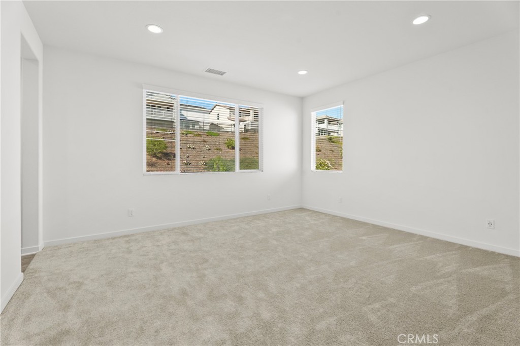 18121 Outlook Way Saugus, CA 91350 - Photo 29 of 59 an empty room with a window