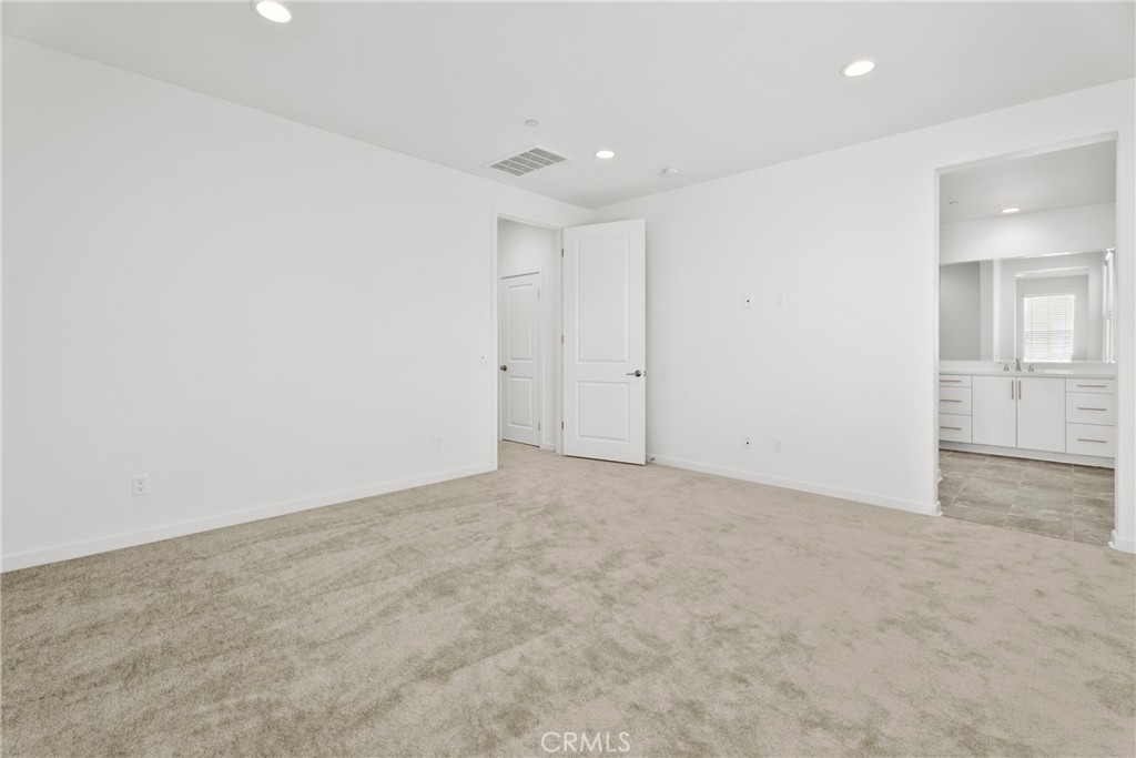 18121 Outlook Way Saugus, CA 91350 - Photo 30 of 59 an empty room with an entryway