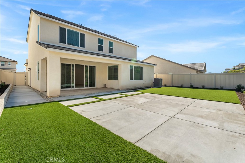 18121 Outlook Way Saugus, CA 91350 - Photo 38 of 59 a front view of a house with a yard and garage