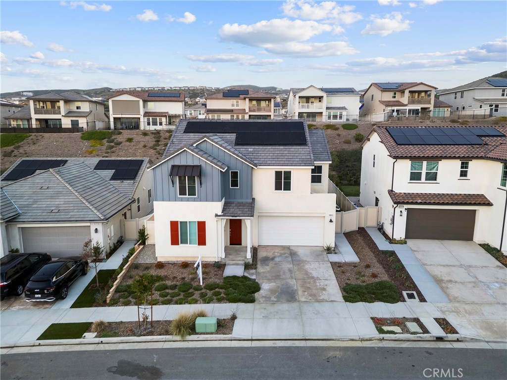 18121 Outlook Way Saugus, CA 91350 - Photo 41 of 59 a front view of a house with a yard