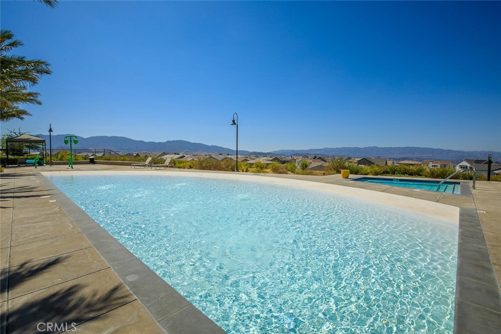 18121 Outlook Way Saugus, CA 91350 - Photo 45 of 59 a view of a swimming pool and an outdoor space