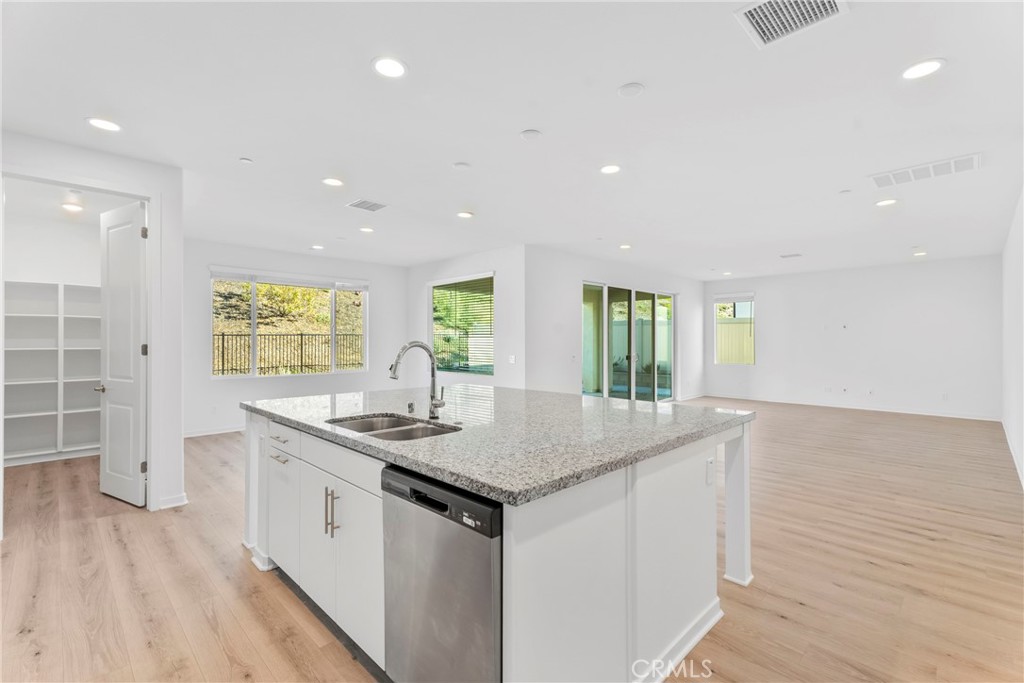 18121 Outlook Way Saugus, CA 91350 - Photo 5 of 59 a kitchen with sink and window