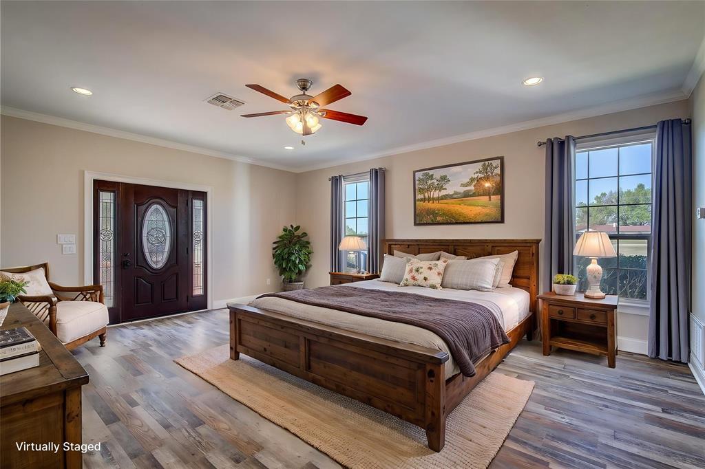 7359 Highway 154 Sulphur Springs, TX 75482 - Photo 20 of 40 downstairs primary suite has separate entrance, Andersen windows, 6-inch baseboards