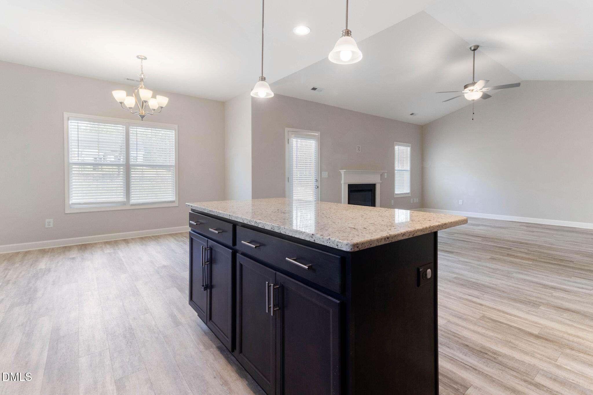 111 Sugarberry Place Spring Lake, NC 28390 - Photo 10 of 29 an empty room with wooden floor and windows