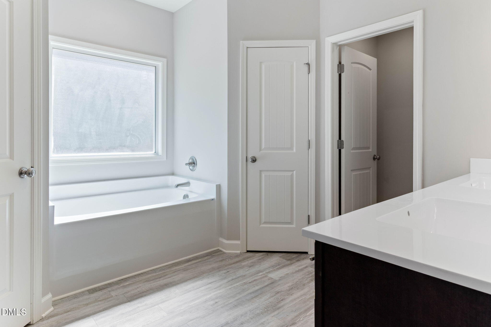 111 Sugarberry Place Spring Lake, NC 28390 - Photo 15 of 29 a bathroom with a bathtub and shower