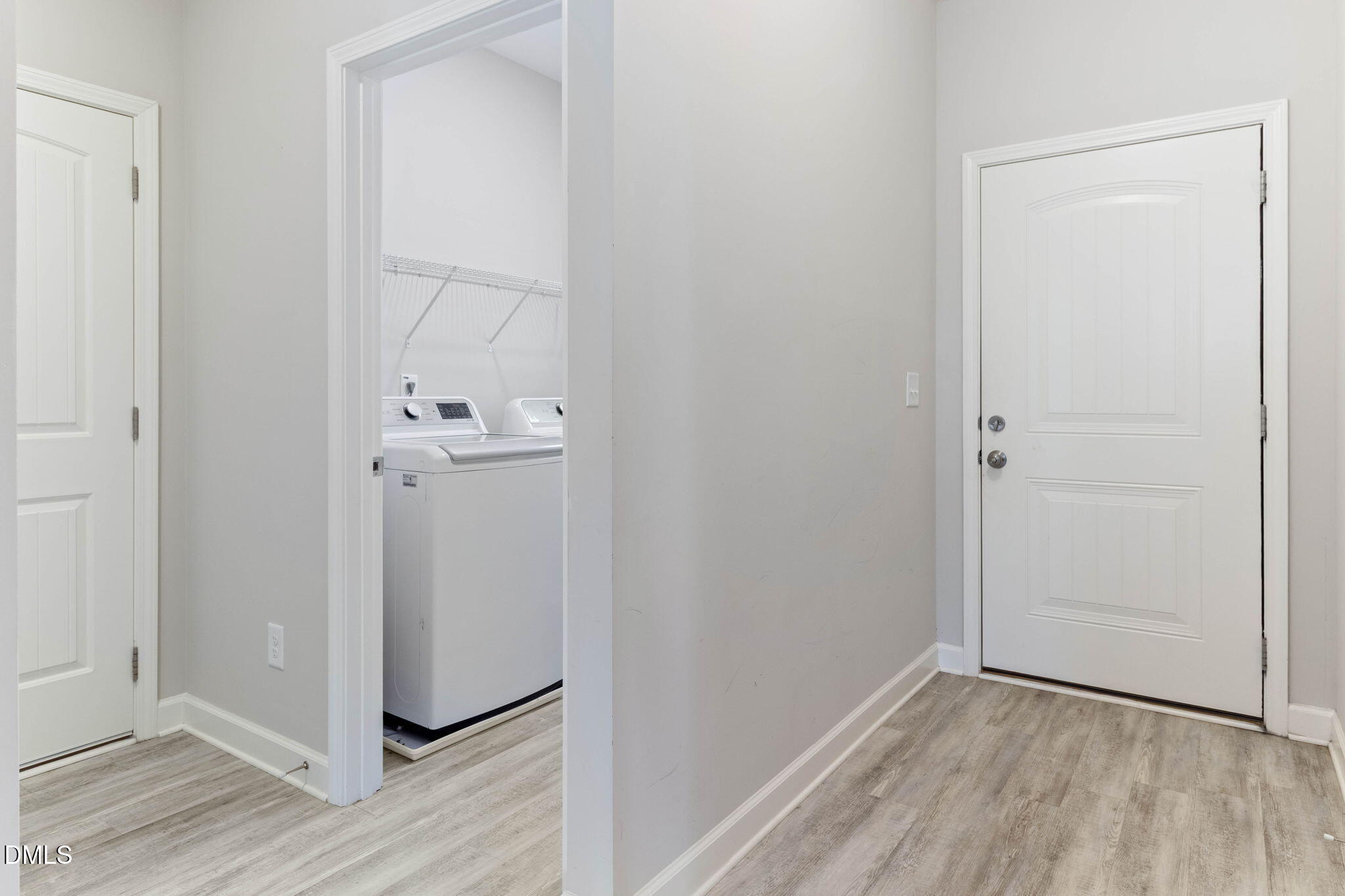 111 Sugarberry Place Spring Lake, NC 28390 - Photo 18 of 29 an empty room with wooden floor and entrance