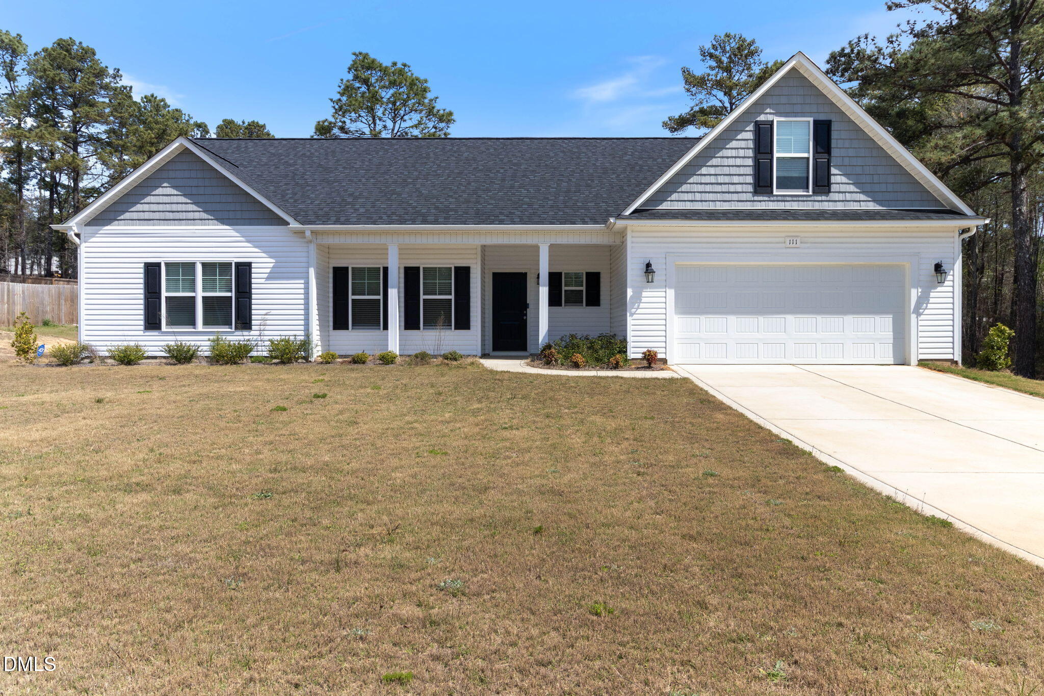 111 Sugarberry Place Spring Lake, NC 28390 - Photo 2 of 29 a front view of a house with a yard