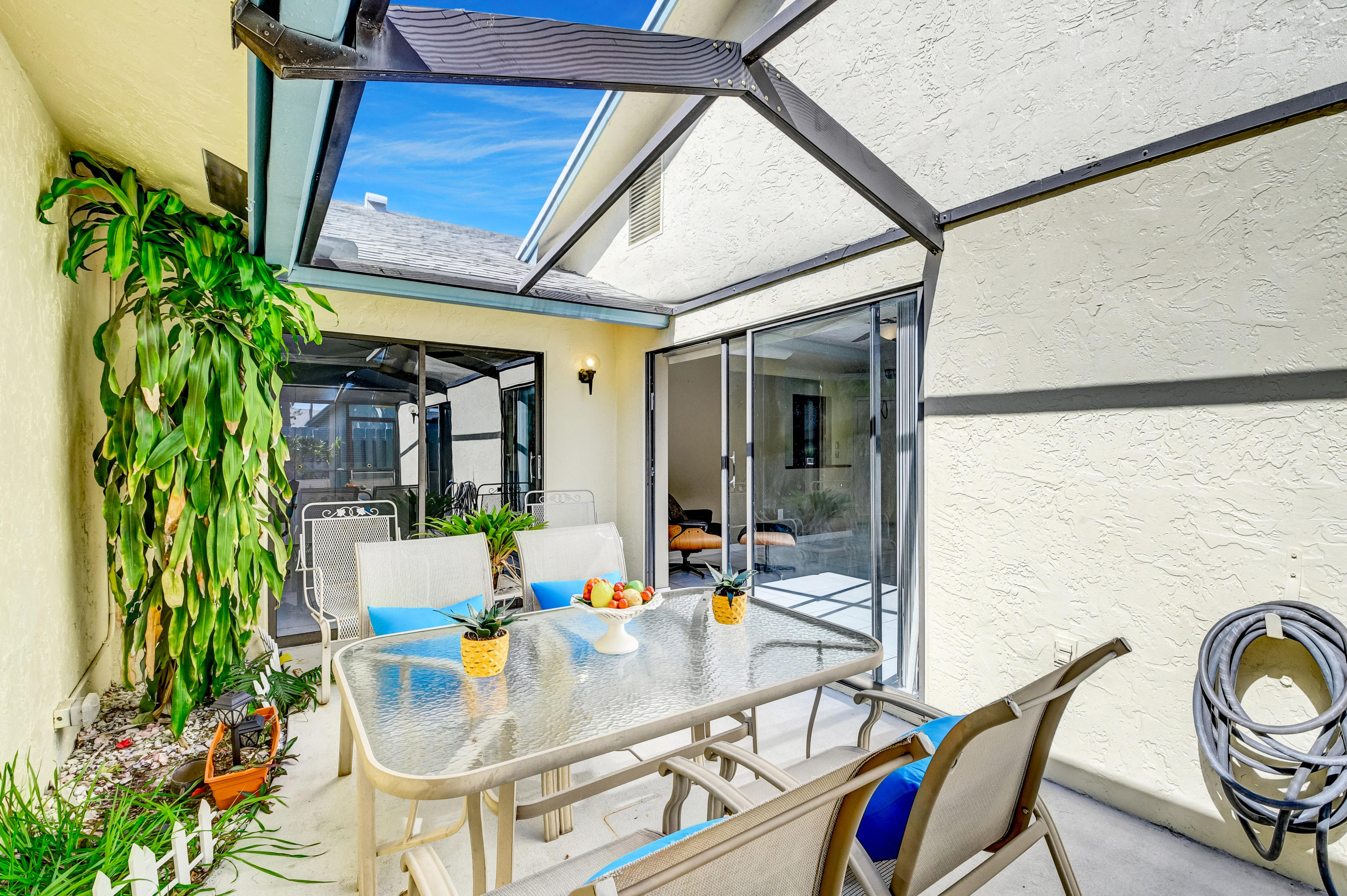 9150 Southwest 20th Street, Unit A Boca Raton, FL 33428 - Photo 32 of 47 Screened in Patio