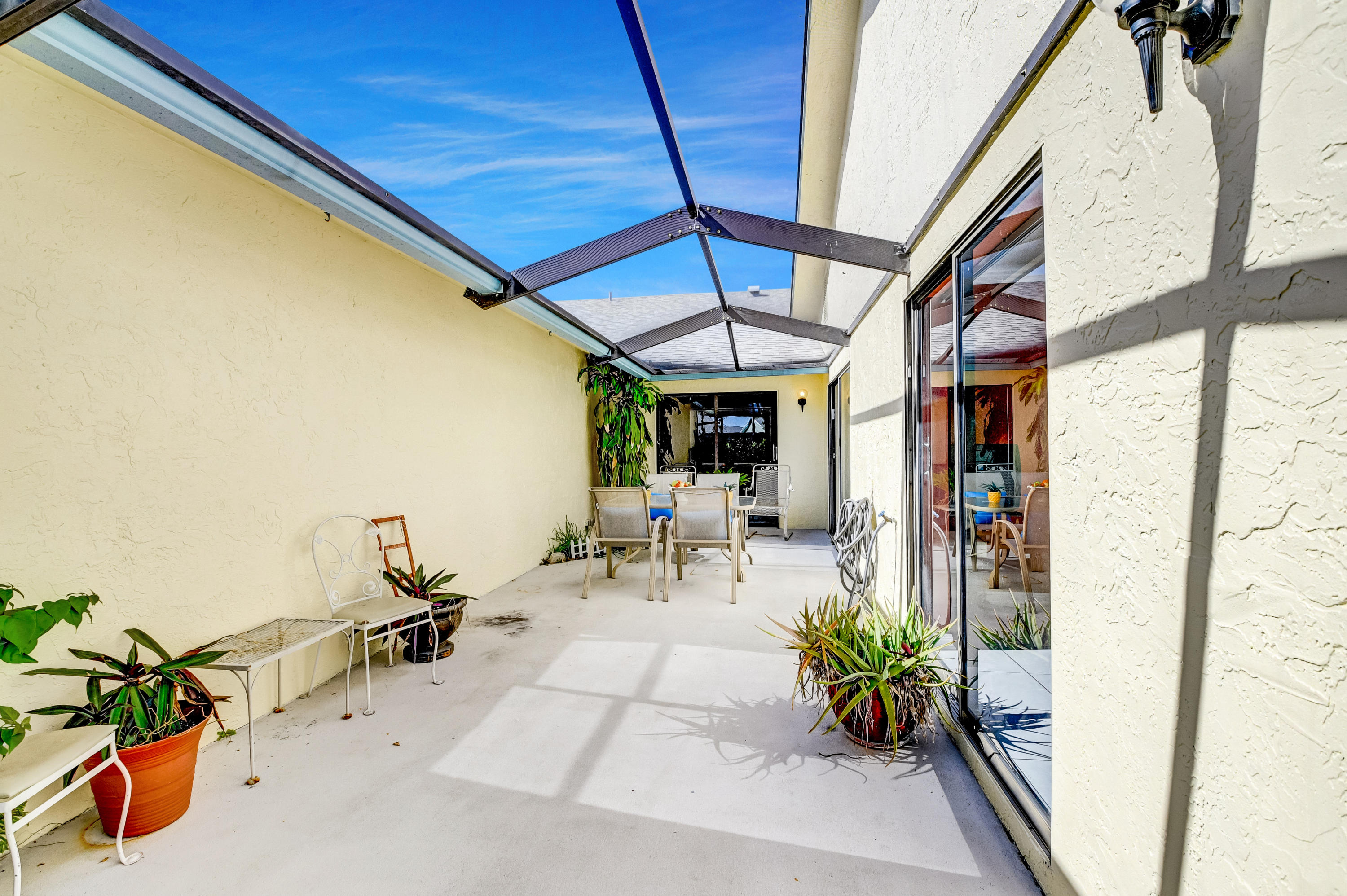9150 Southwest 20th Street, Unit A Boca Raton, FL 33428 - Photo 33 of 47 Screened in Patio