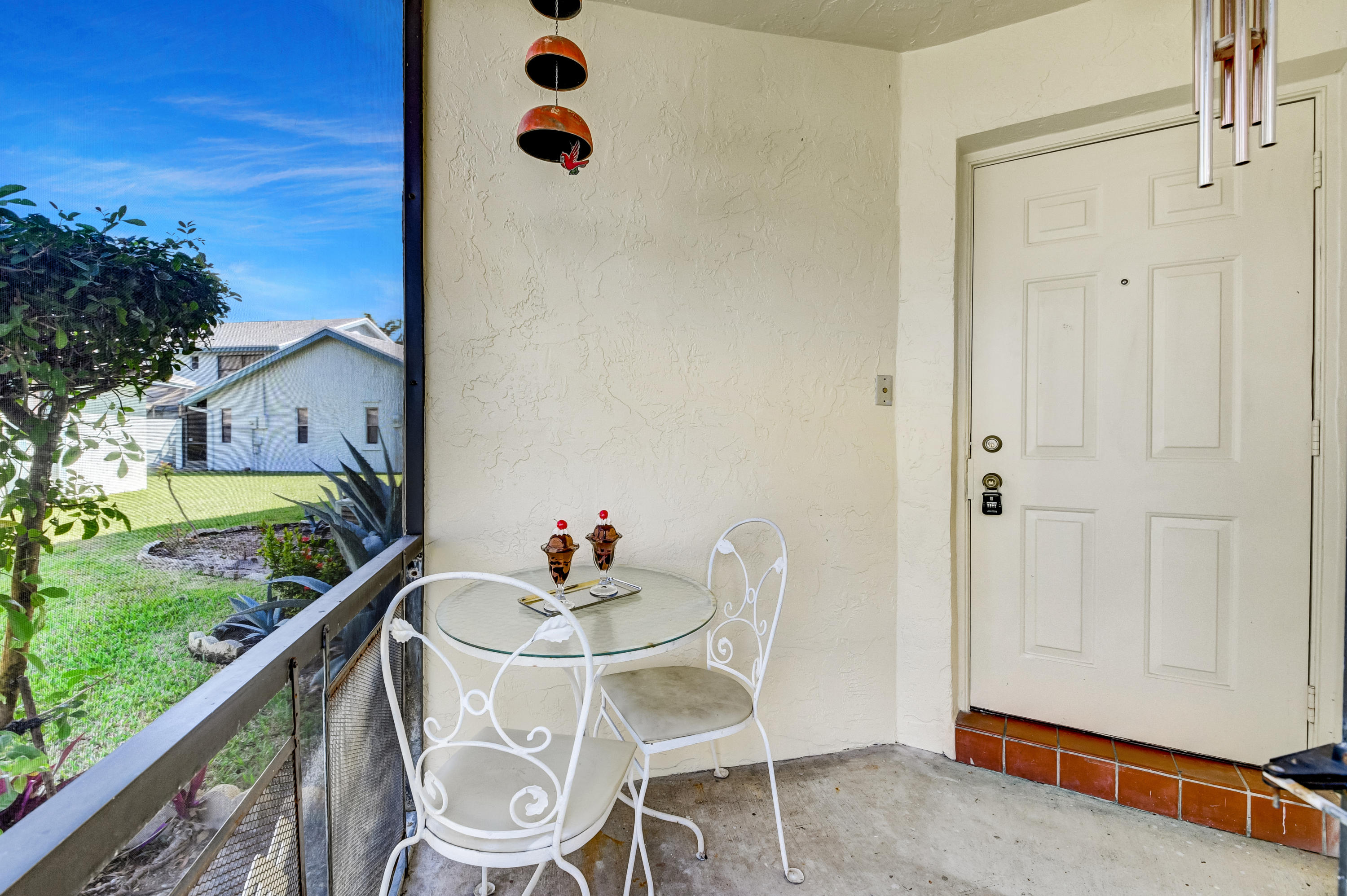 9150 Southwest 20th Street, Unit A Boca Raton, FL 33428 - Photo 10 of 47 Screened in Entry