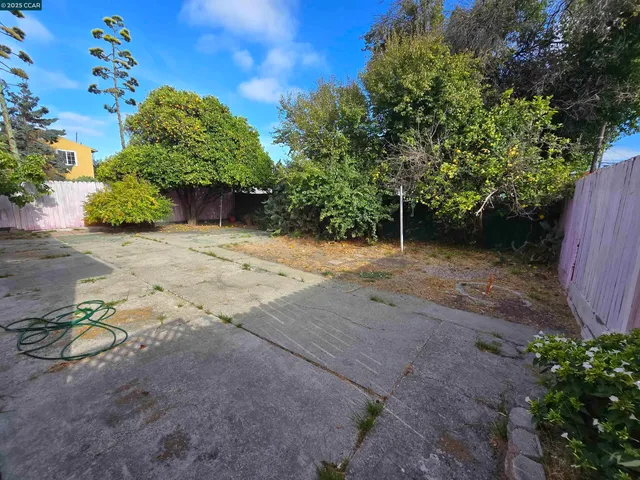 a view of a backyard of a house