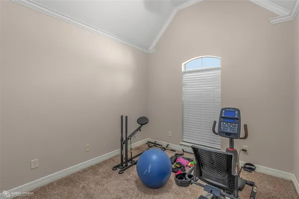 a bathroom with a granite countertop sink a mirror a vanity and a bathtub